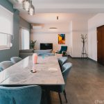Spacious dining area with seating for up to 6 people and a dedicated high chair for babies. Charys Premium Home