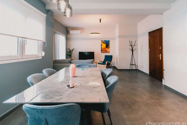 Spacious dining area with seating for up to 6 people and a dedicated high chair for babies. Charys Premium Home