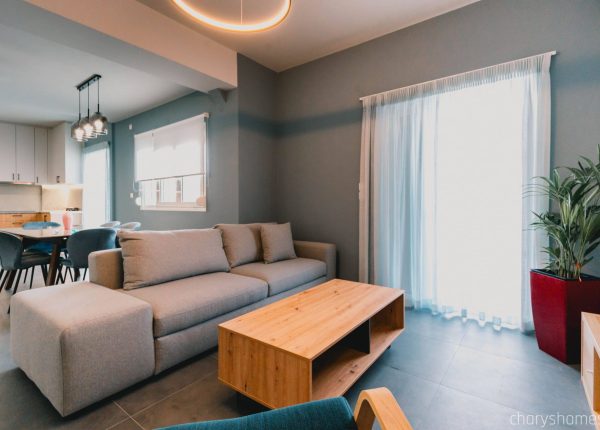Luxury Vacation Home in Preveza, Greece with large smart TV, dedicated work desk, and comfortable seating area. Charys Premium Home.